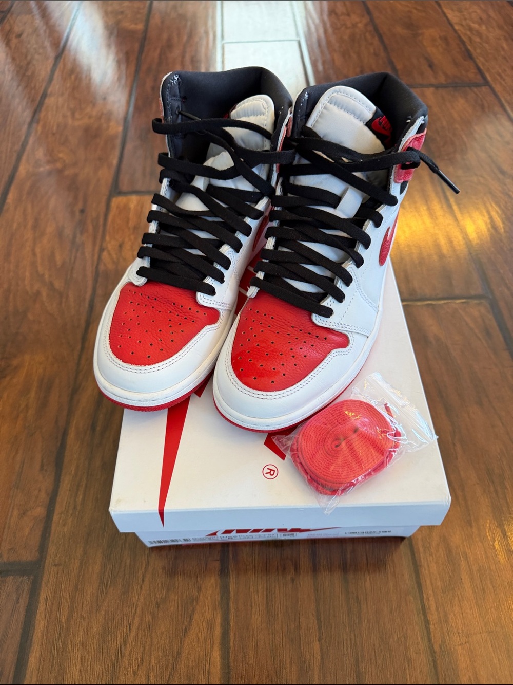 Air Jordan1 Retro High OG Sneakers in White, Red and Black